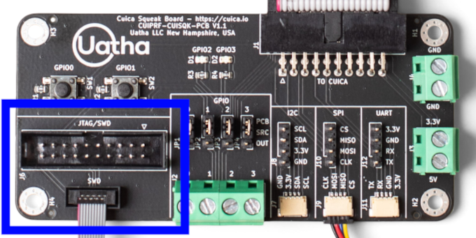 Photo showing the 20-pin JTAG and SWD programming ports of the Squeak Board